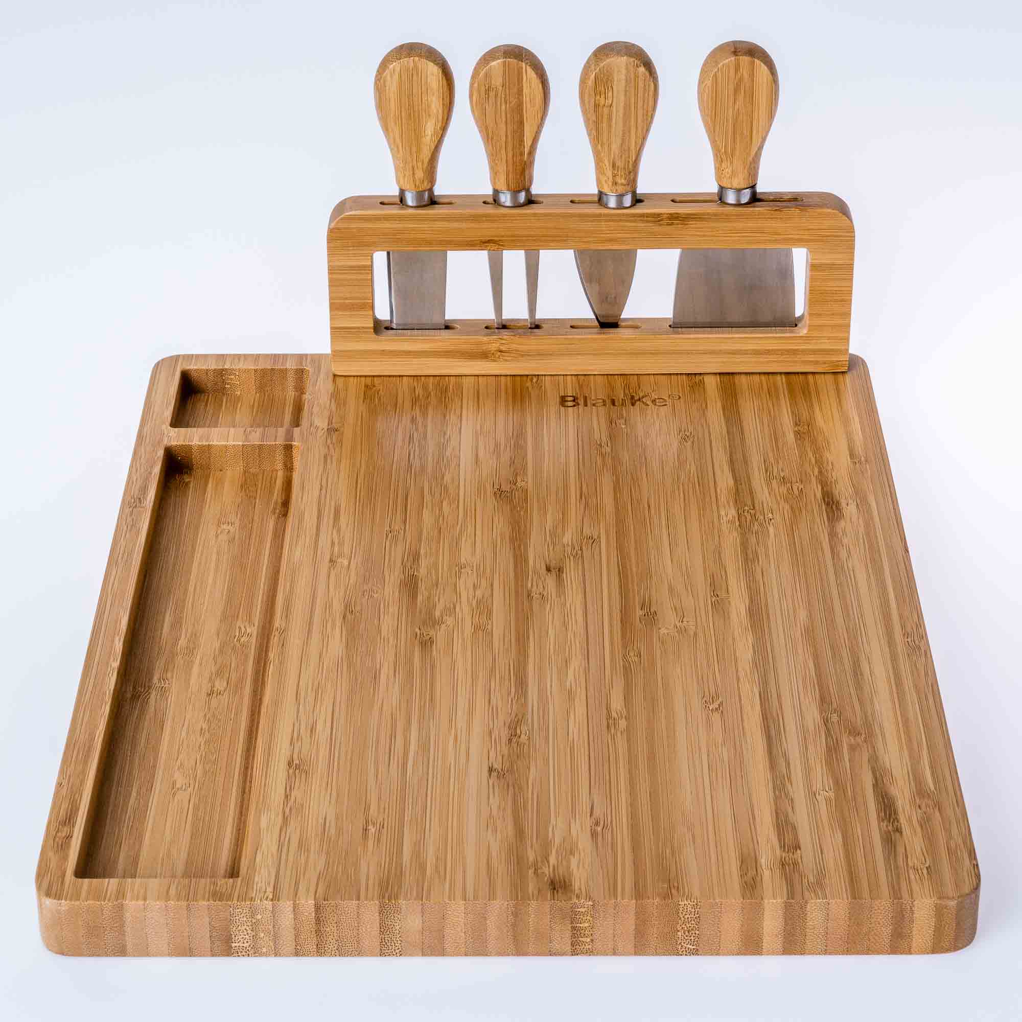 Elegant bamboo cheese board and knife set, featuring a 14x11 inch surface with included cheese knives and serving fork.