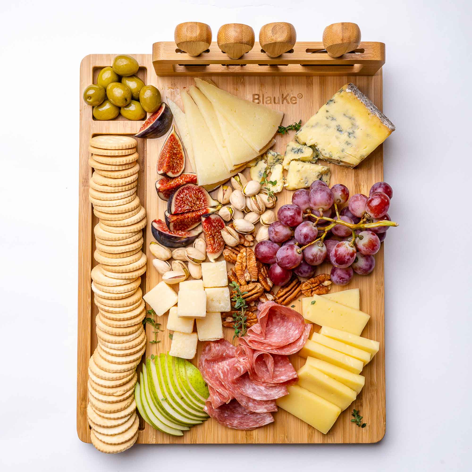 Elegant bamboo cheese board and knife set, featuring a 14x11 inch surface with included cheese knives and serving fork.