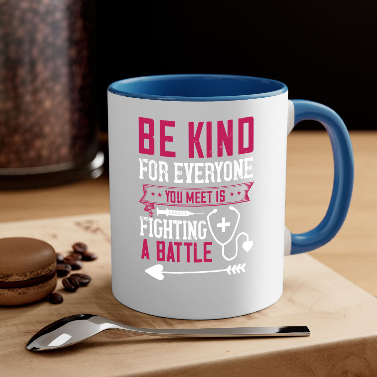 BE KIND mug featuring a motivational quote, available in multiple colors with a glossy finish and easy-grip handle.