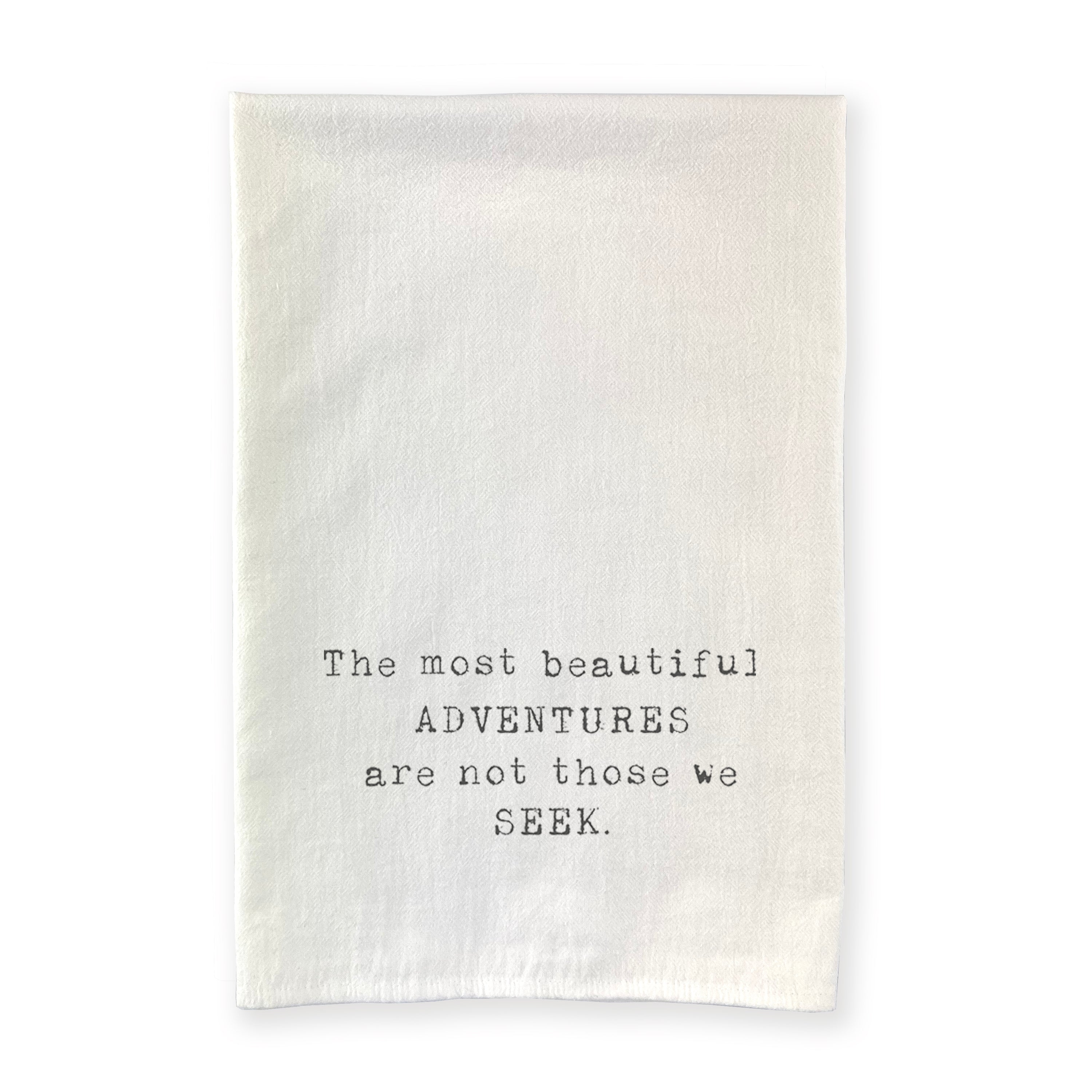 Beautiful Adventures cotton tea towel featuring vibrant design and hemmed edges, perfect for kitchen use.