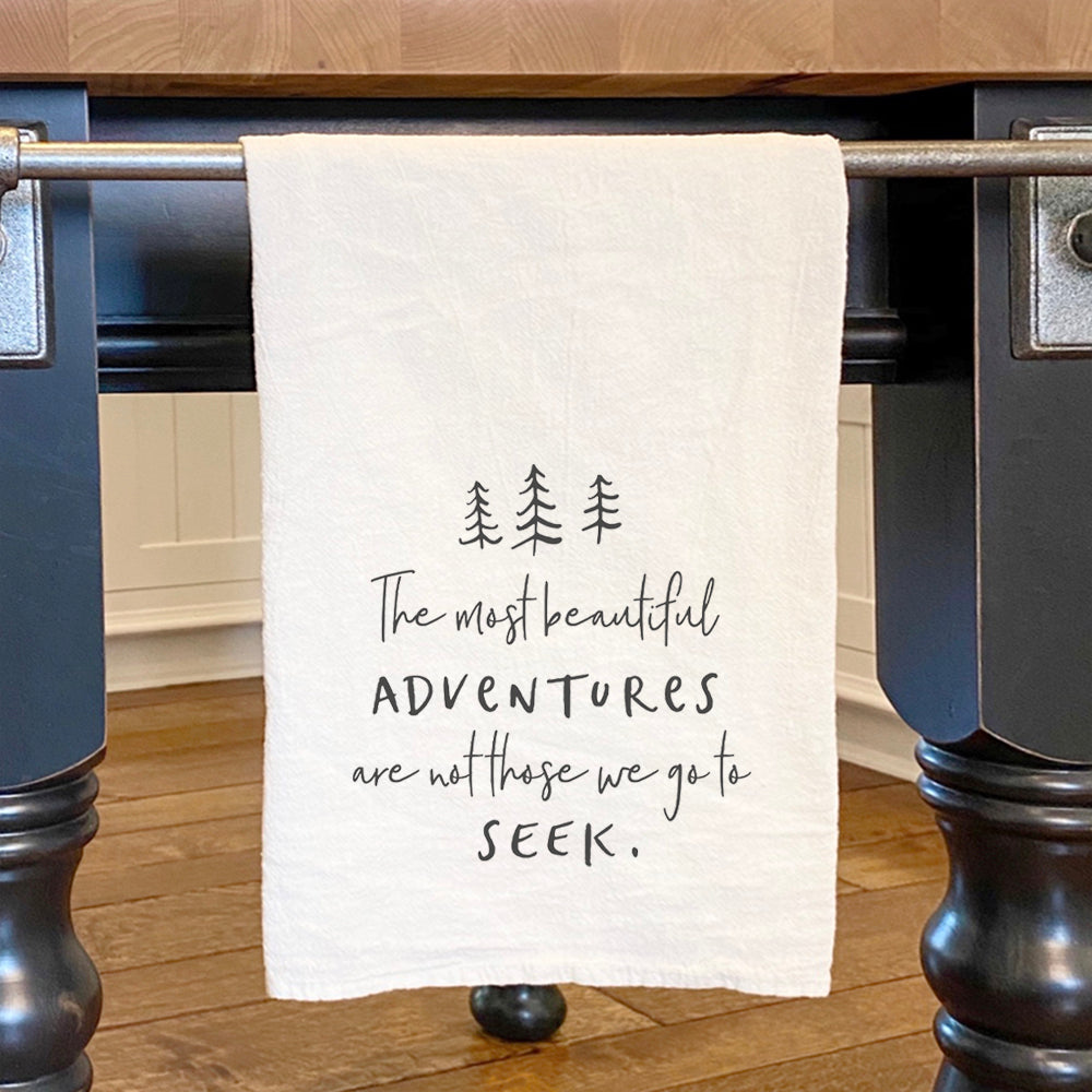 Beautiful Adventures cotton tea towel featuring a vibrant tree design, made from 100% absorbent cotton.