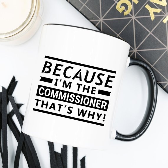 A humorous coffee mug with the phrase 'Because I'm The Commissioner, That's Why!' printed on it, showcasing a fun design suitable for gifting.