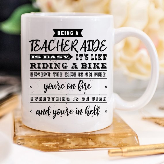 Funny coffee mug with humorous quote for teachers, featuring a vibrant design and high-quality ceramic material.