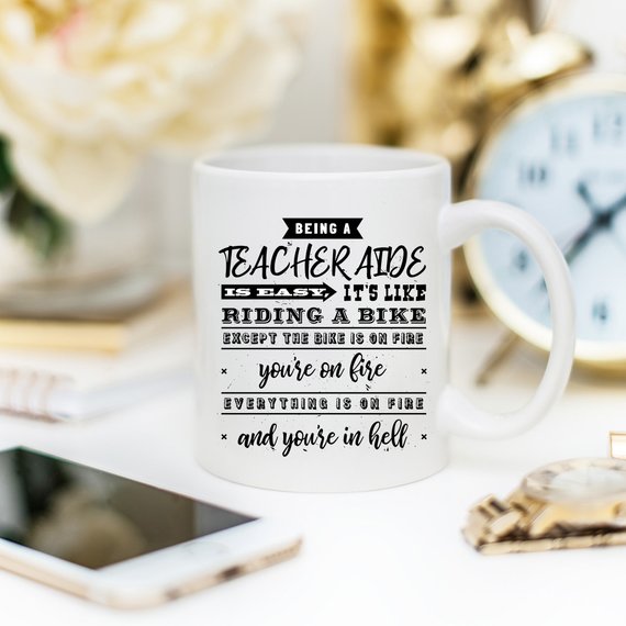 Funny coffee mug with humorous quote for teachers, featuring a vibrant design and high-quality ceramic material.