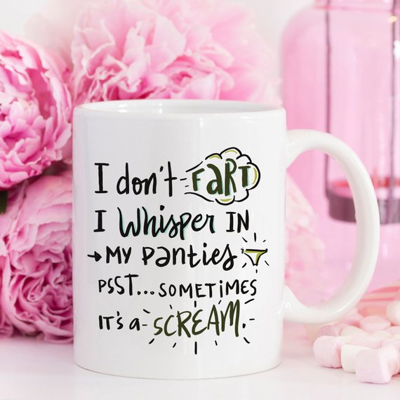 Funny coffee mug with the phrase 'I Don't Fart. I Whisper' printed on it, showcasing a humorous design perfect for gifts.