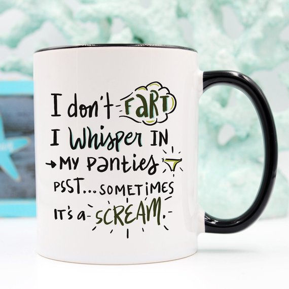 Funny coffee mug with the phrase 'I Don't Fart. I Whisper' printed on it, showcasing a humorous design perfect for gifts.