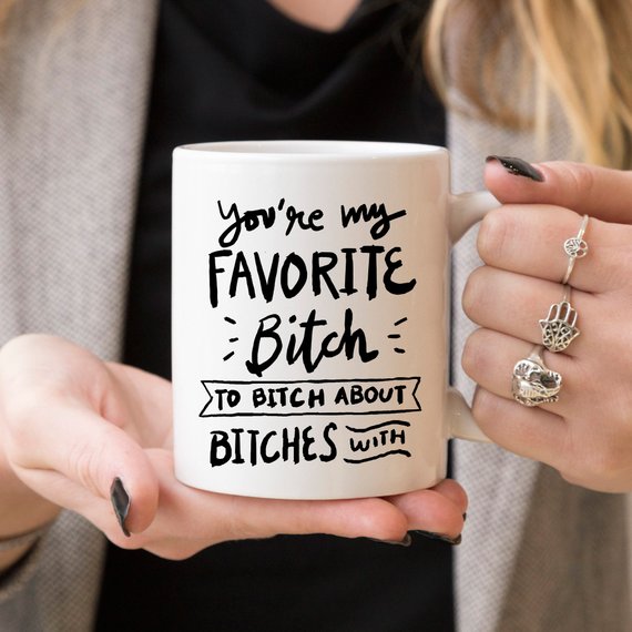 A humorous coffee mug featuring the phrase 'You're My Favorite Bitch To Bitch About Bitches With', crafted from high-quality ceramic.