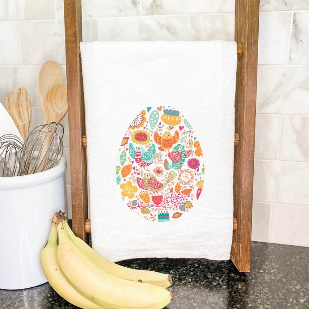 Bird and Floral Egg cotton tea towel featuring vibrant colors and floral patterns, perfect for kitchen use.