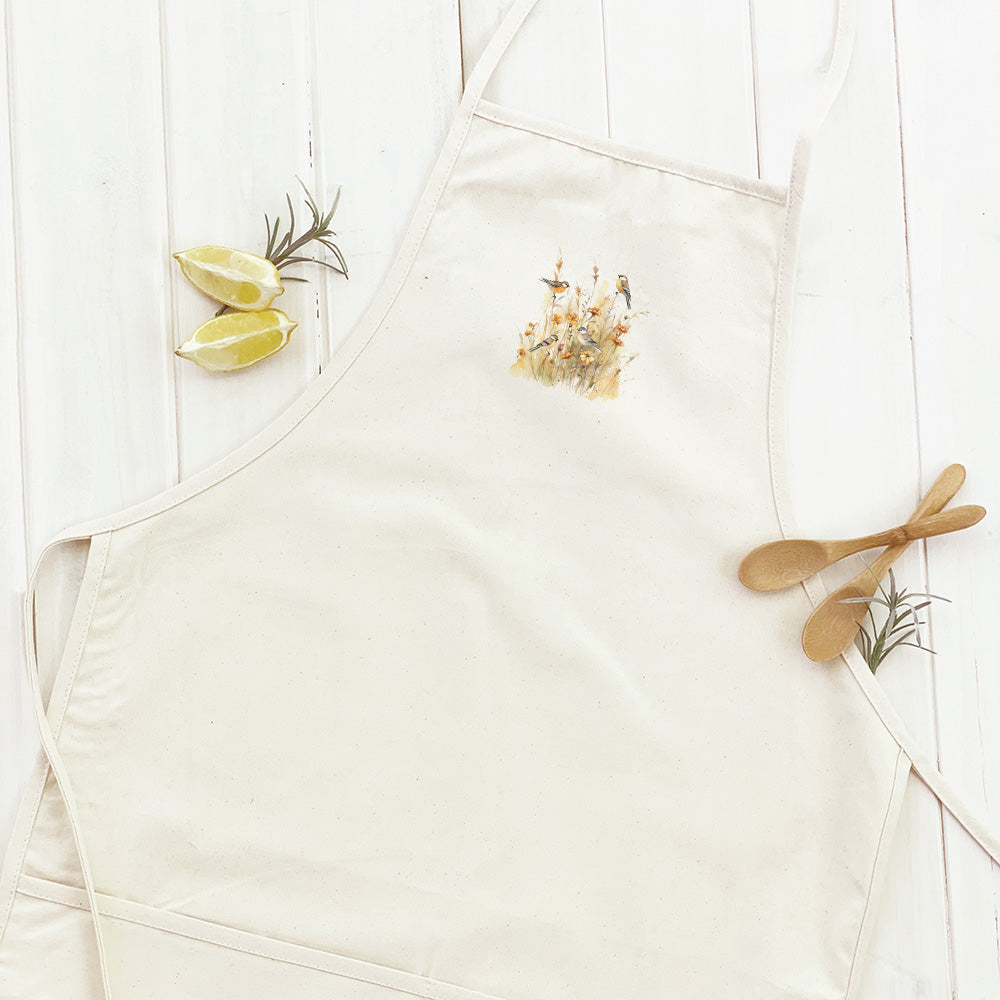 Birds in Tall Grass Women's Apron featuring elegant design and divided front pocket, made from durable cotton canvas.