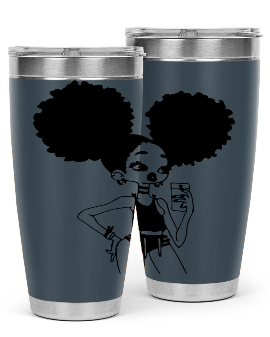 A stylish tumbler featuring a black girl taking a mirror selfie, showcasing its sleek design and vibrant colors.