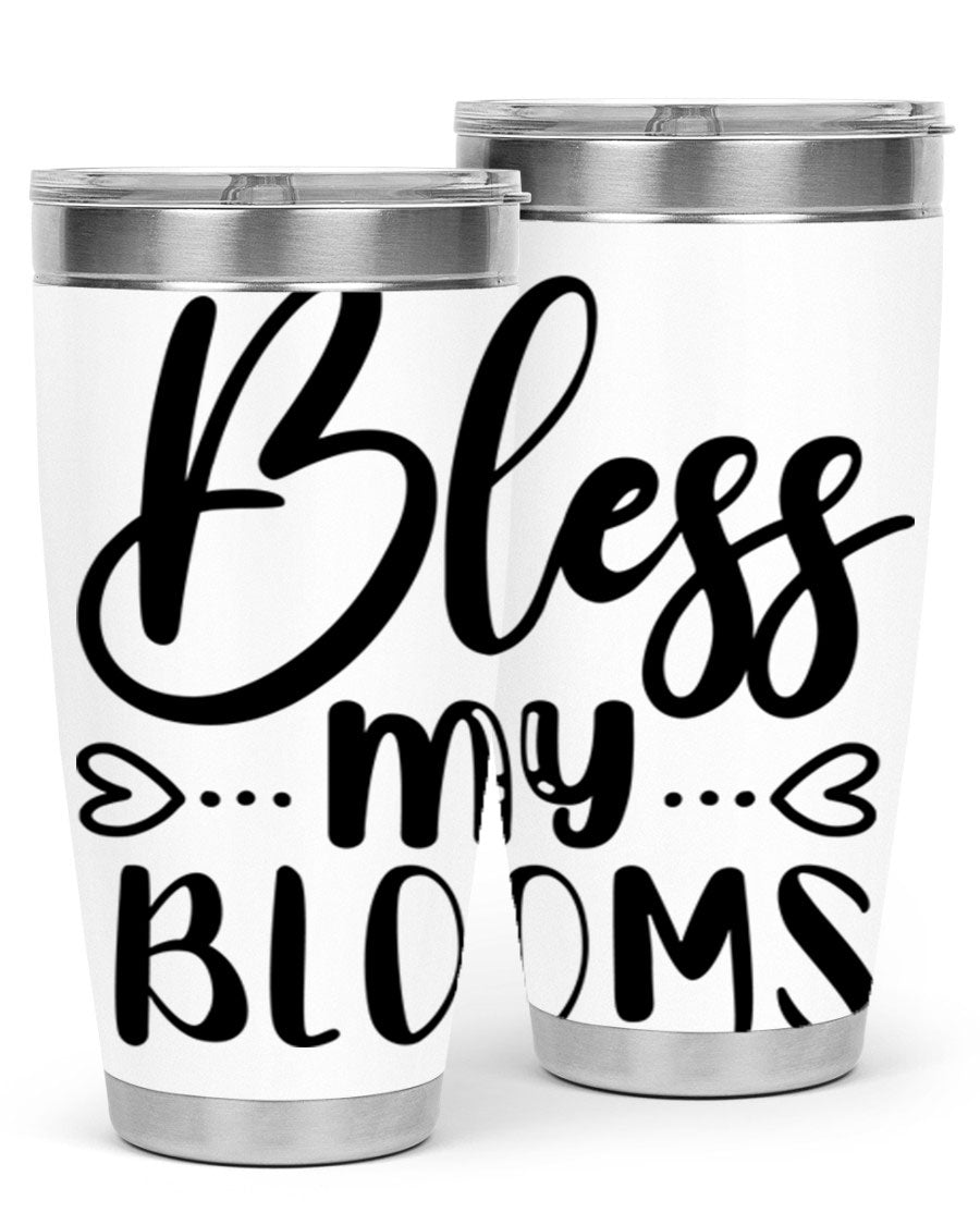 A stylish BLESS MY BLOOMS 20oz tumbler made of stainless steel with a vibrant floral design, featuring a drink-thru lid.