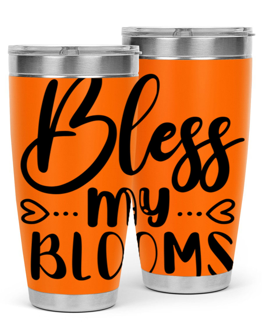 A stylish BLESS MY BLOOMS 20oz tumbler made of stainless steel with a vibrant floral design, featuring a drink-thru lid.