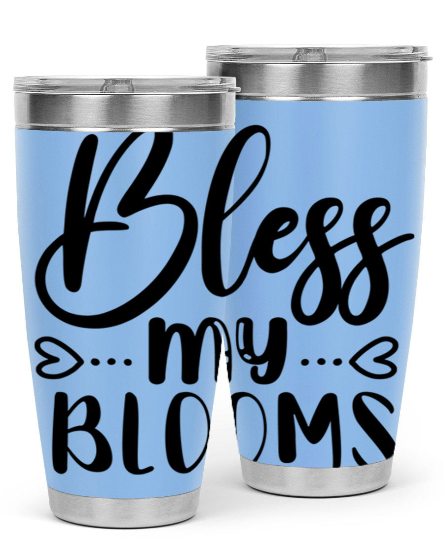 A stylish BLESS MY BLOOMS 20oz tumbler made of stainless steel with a vibrant floral design, featuring a drink-thru lid.