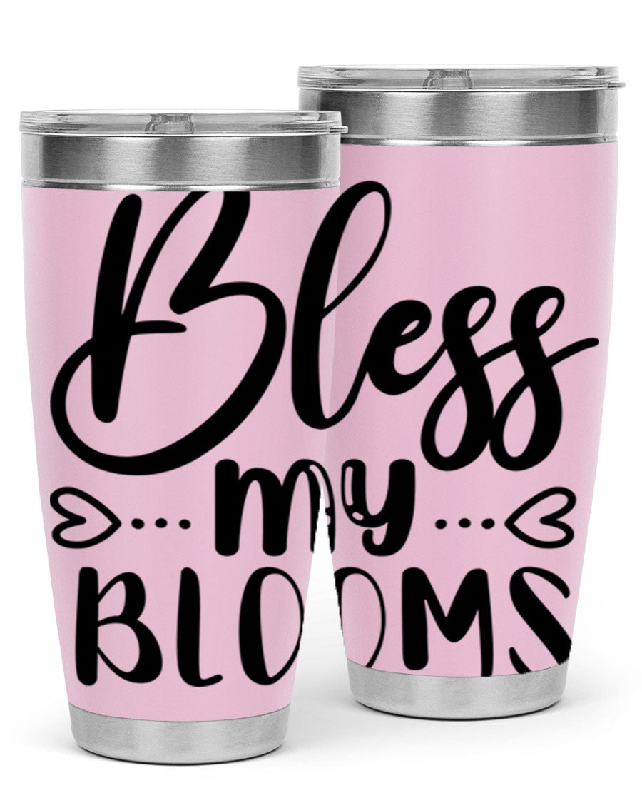 A stylish BLESS MY BLOOMS 20oz tumbler made of stainless steel with a vibrant floral design, featuring a drink-thru lid.