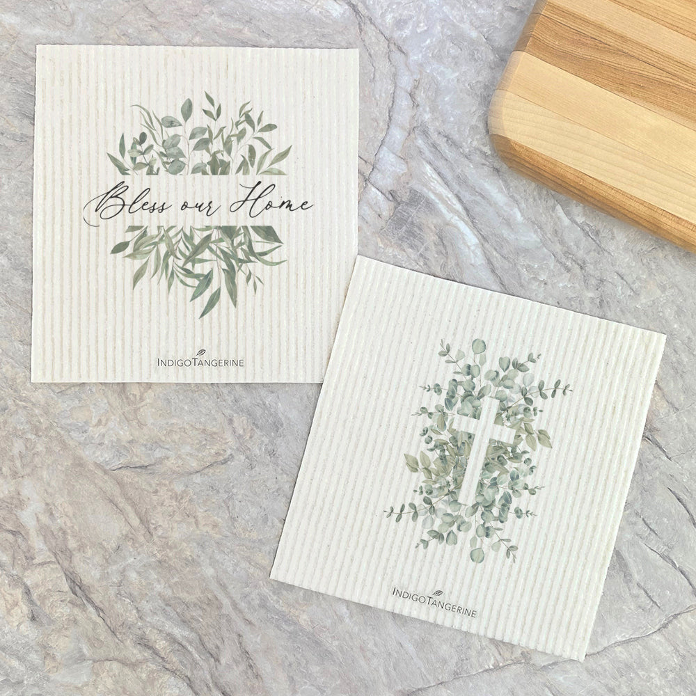 Two eco-friendly Swedish dish cloths with eucalyptus cross design, showcasing their natural materials and beautiful patterns.