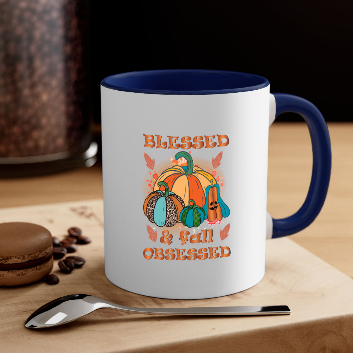 A stylish two-tone Blessed Fall Obsessed Mug with a glossy finish, featuring a colored handle and interior, perfect for coffee or tea.