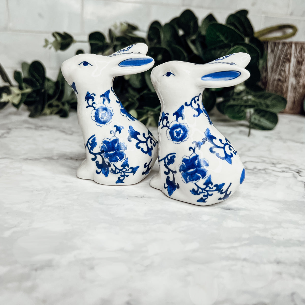 Charming blue and white bunny salt and pepper shakers, hand-painted porcelain design, perfect for spring and Easter decor.