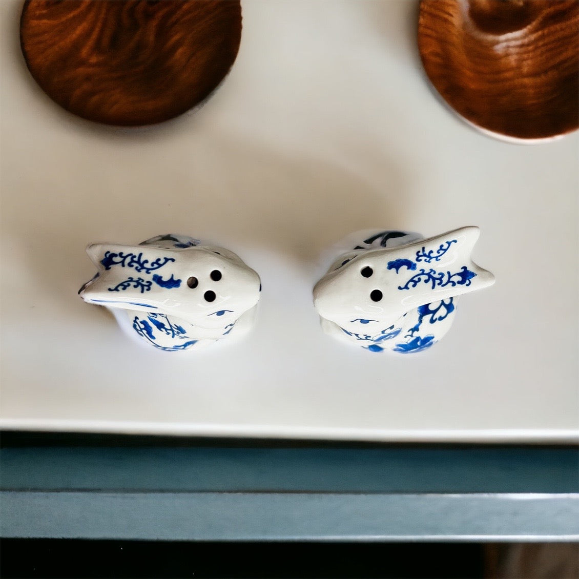 Charming blue and white bunny salt and pepper shakers, hand-painted porcelain design, perfect for spring and Easter decor.