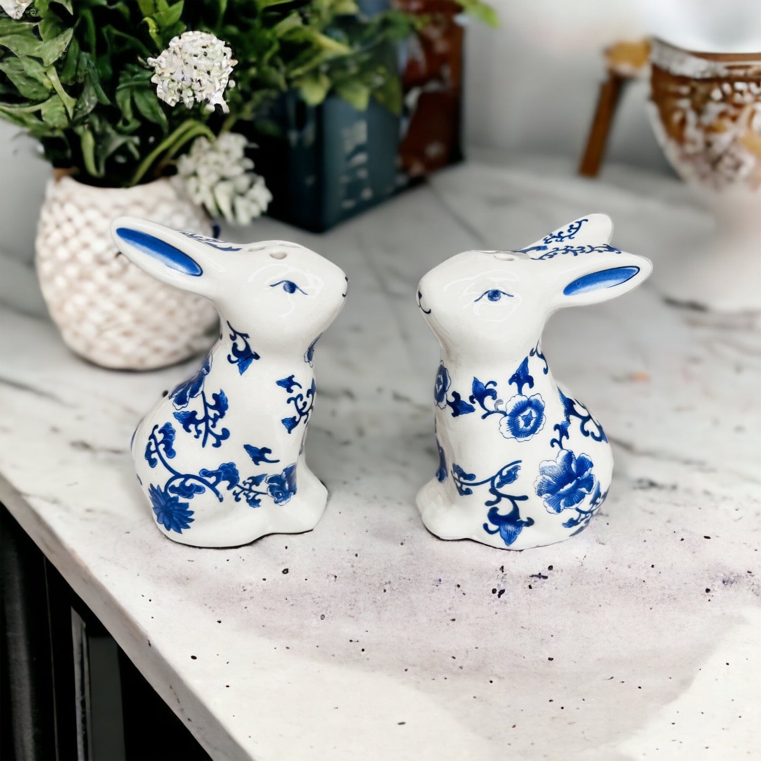 Charming blue and white bunny salt and pepper shakers, hand-painted porcelain design, perfect for spring and Easter decor.