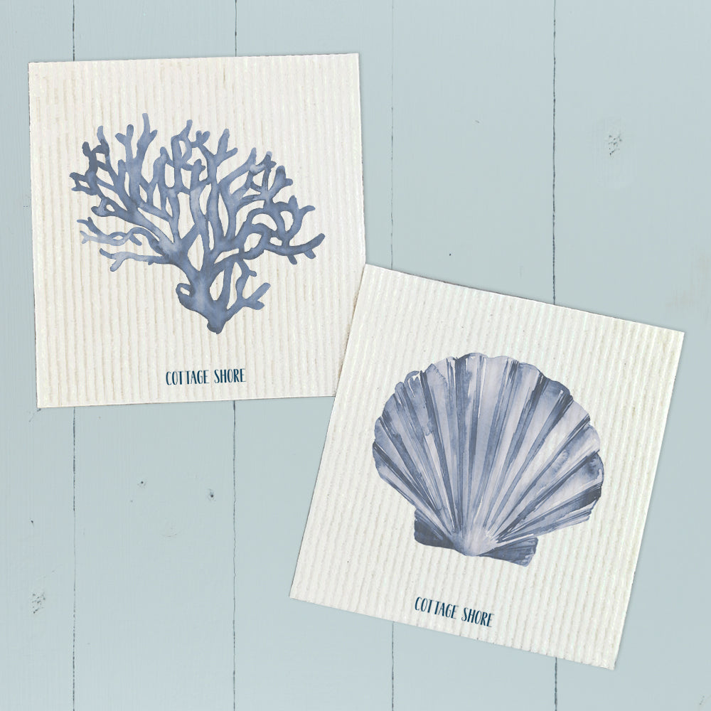 Two Swedish dish cloths featuring a blue coral shell design, made from eco-friendly materials.