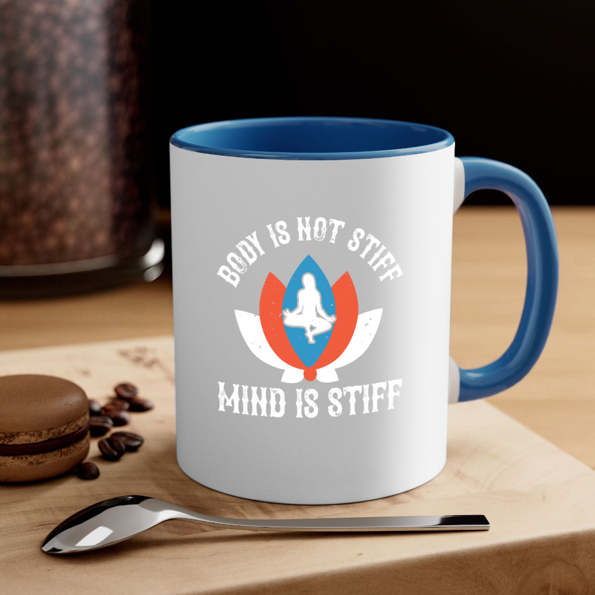 A two-tone ceramic coffee mug featuring the phrase 'Body is Not Stiff Mind is Stiff', available in five colors with a glossy finish.