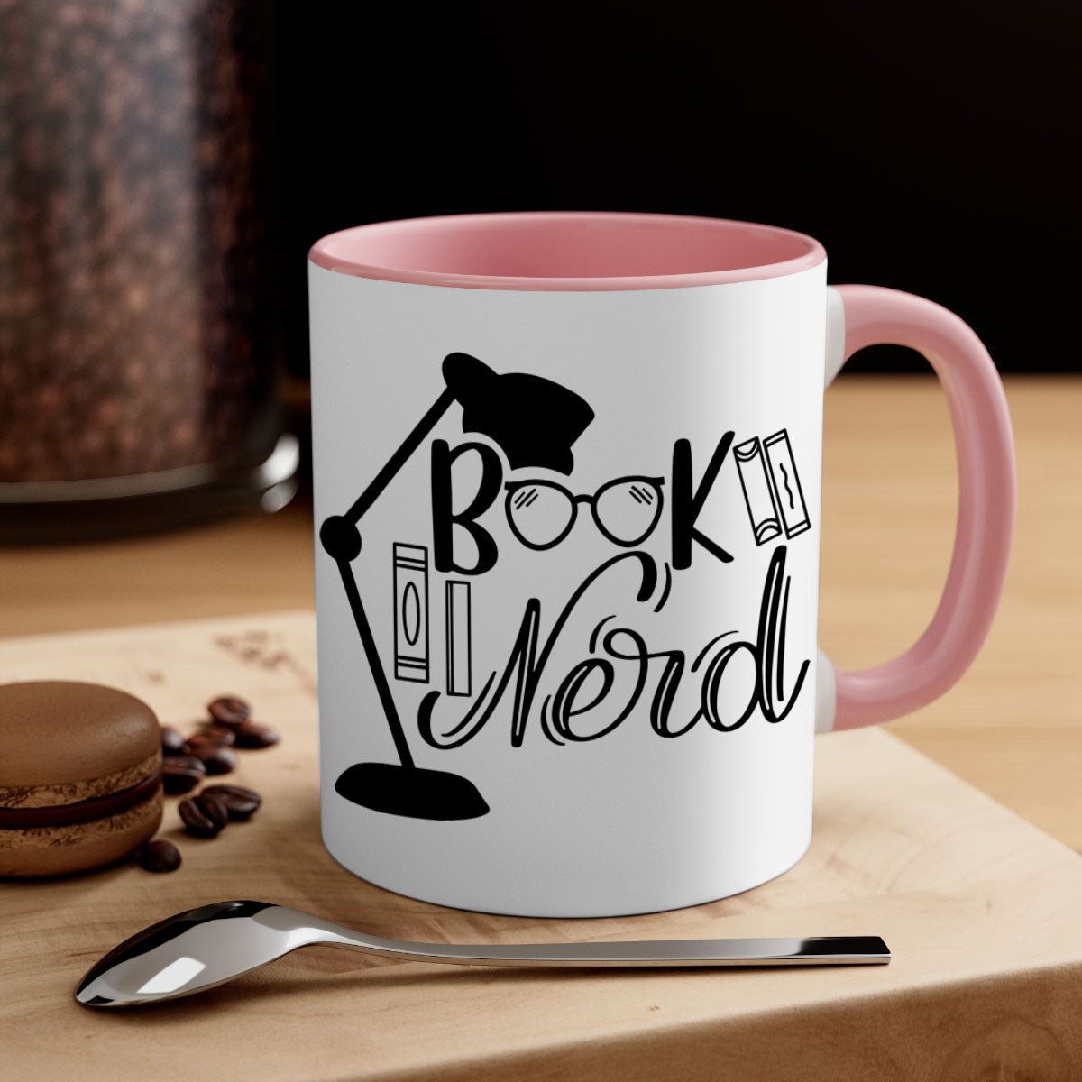 A stylish Book Nerd Mug featuring a two-tone design with a colored handle and glossy finish, perfect for coffee and tea lovers.