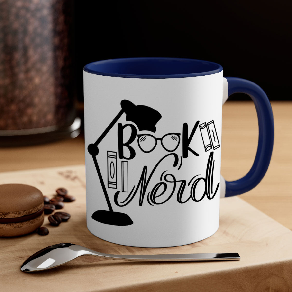 A stylish Book Nerd Mug featuring a two-tone design with a colored handle and glossy finish, perfect for coffee and tea lovers.