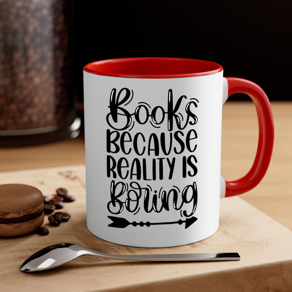 A stylish two-tone ceramic mug with the phrase 'Books Because Reality is Boring', featuring a colored handle and glossy finish.