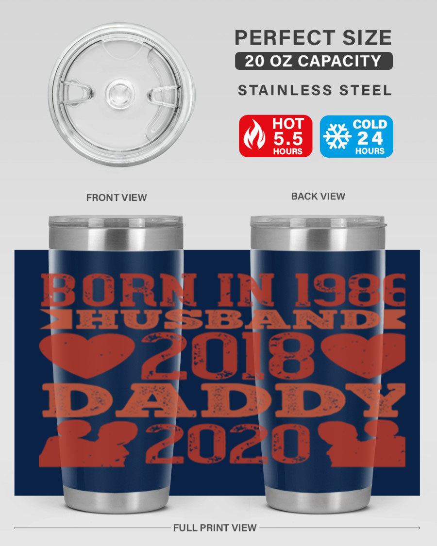 A stylish 'Born in Husband Daddy' tumbler in stainless steel, showcasing its double wall vacuum design and drink-thru lid.