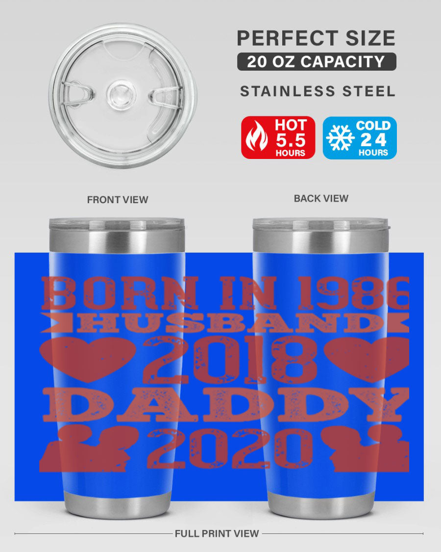 A stylish 'Born in Husband Daddy' tumbler in stainless steel, showcasing its double wall vacuum design and drink-thru lid.