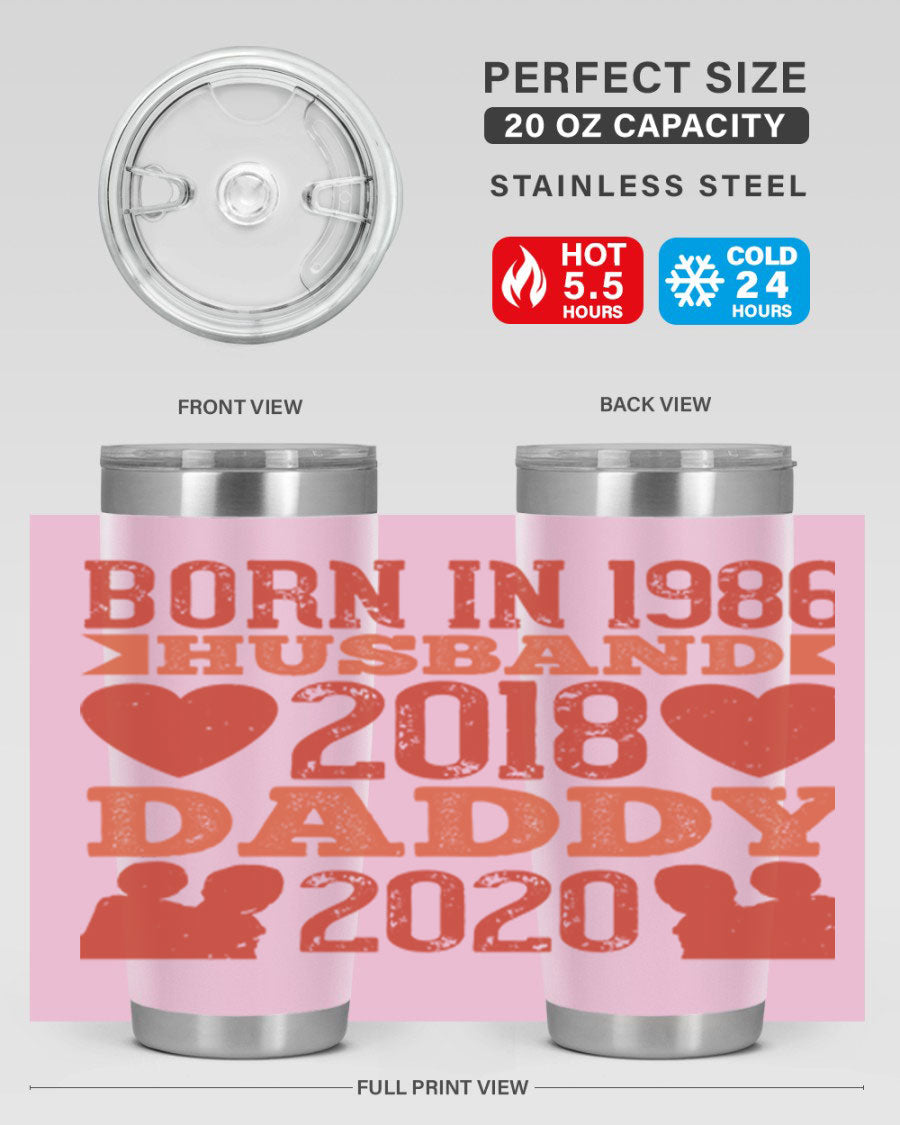 A stylish 'Born in Husband Daddy' tumbler in stainless steel, showcasing its double wall vacuum design and drink-thru lid.