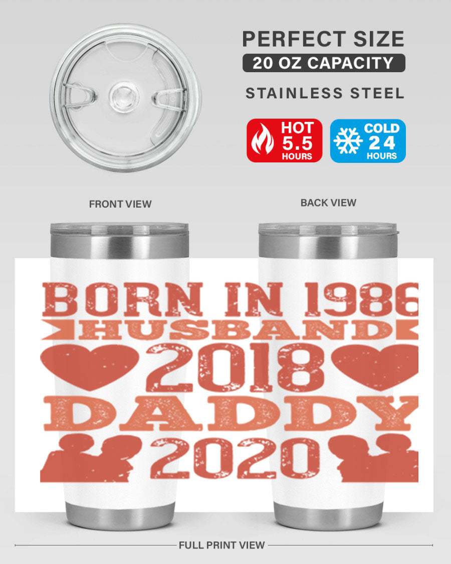 A stylish 'Born in Husband Daddy' tumbler in stainless steel, showcasing its double wall vacuum design and drink-thru lid.