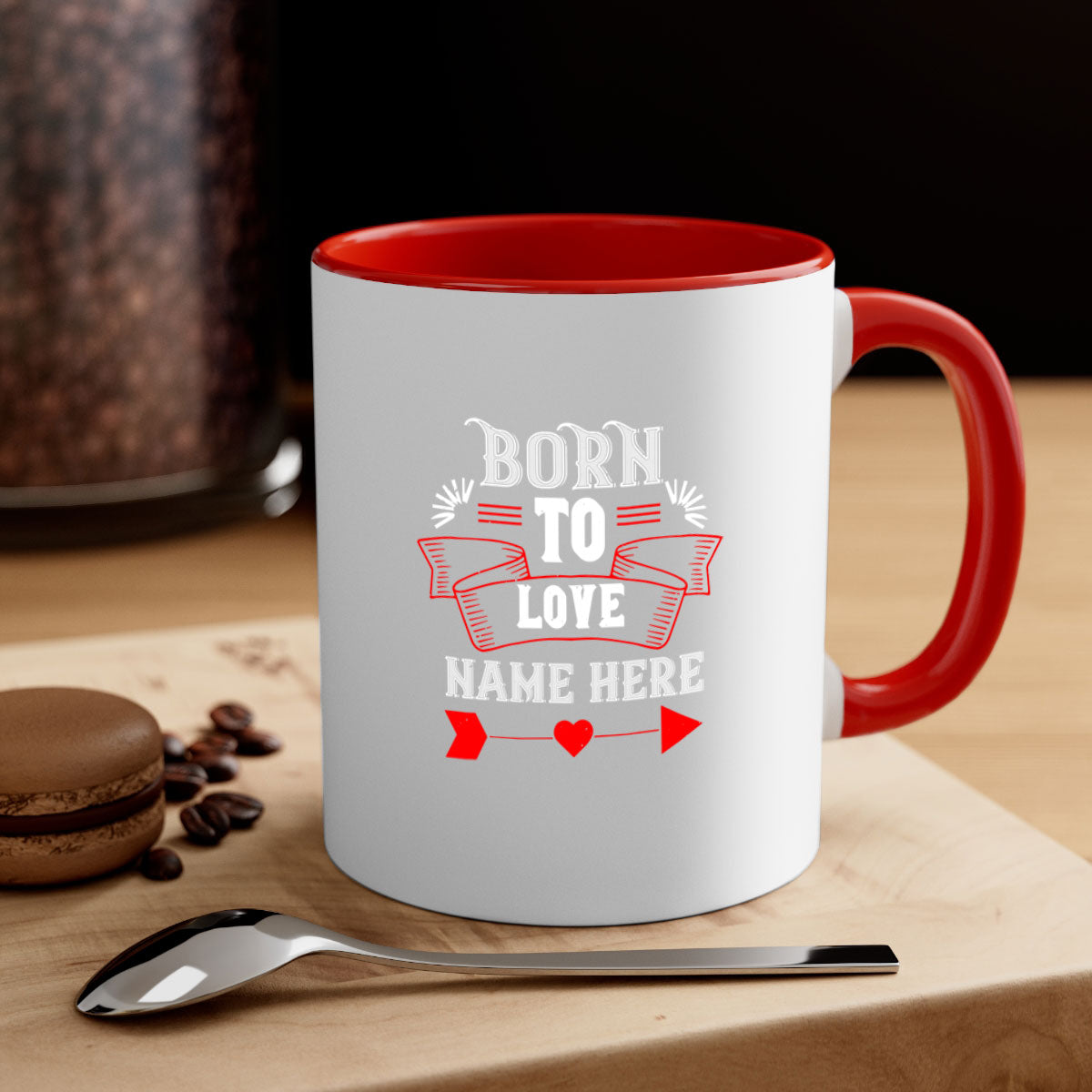 A stylish two-tone 'Born to Love' mug with a colored handle and glossy finish, perfect for Valentine's Day.