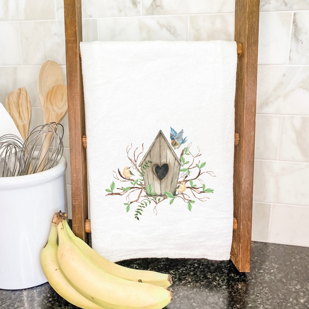 Budding Birdhouse Cotton Tea Towel featuring a vibrant birdhouse design on absorbent fabric, perfect for kitchen use.