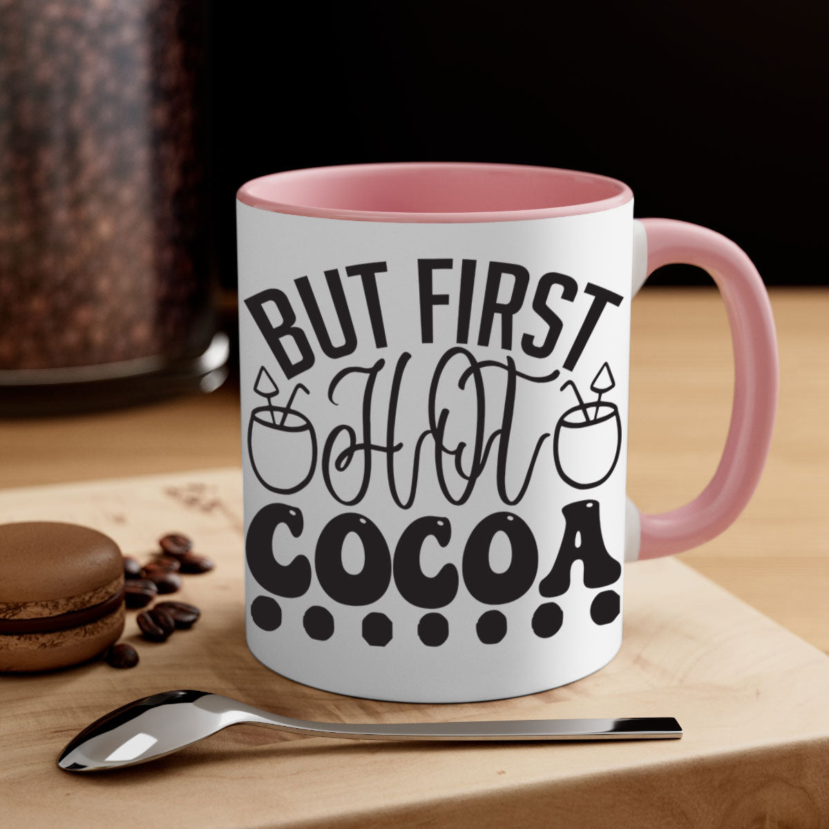 A stylish two-tone But First Hot Cocoa Mug with a colored handle and glossy finish, perfect for winter beverages.