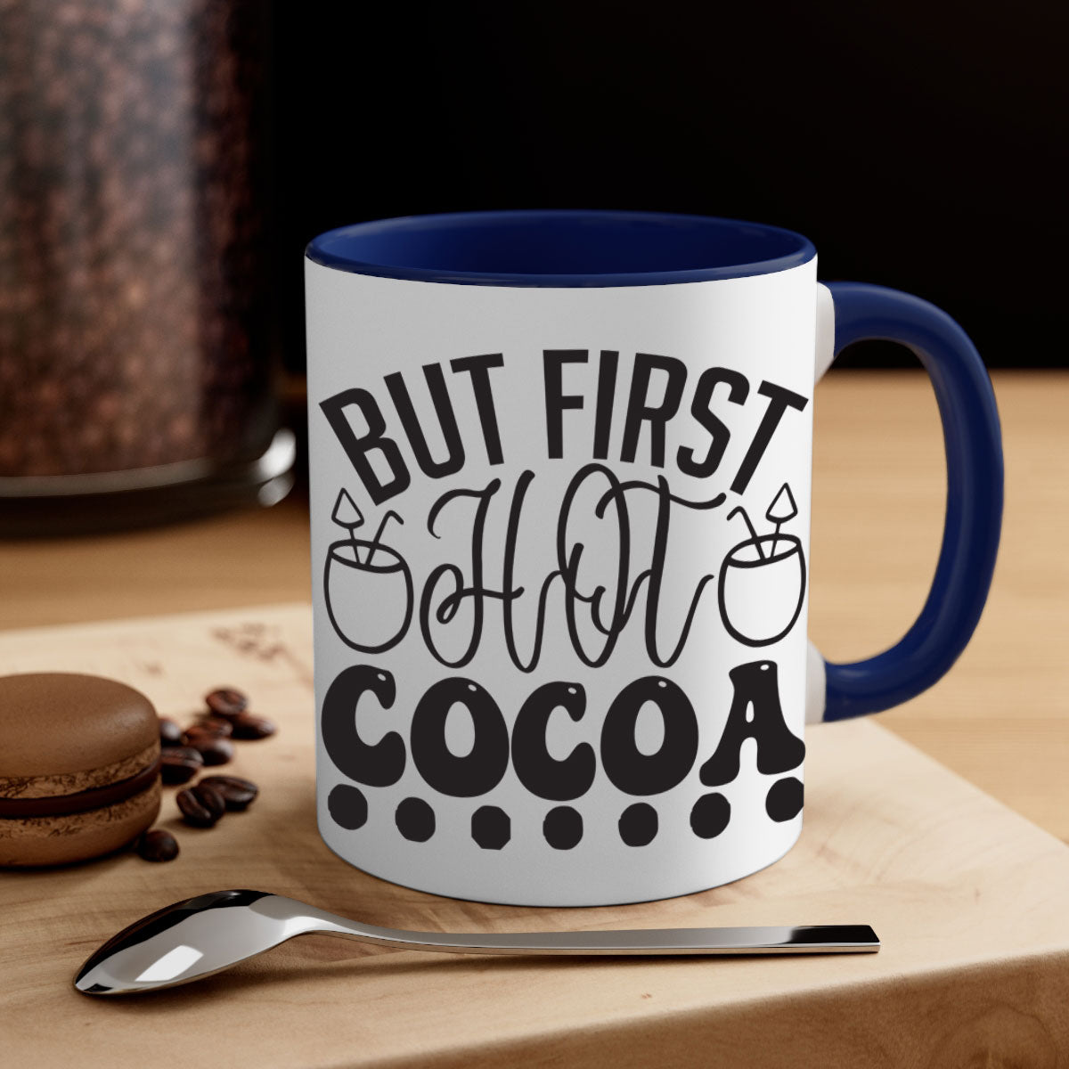 A stylish two-tone But First Hot Cocoa Mug with a colored handle and glossy finish, perfect for winter beverages.