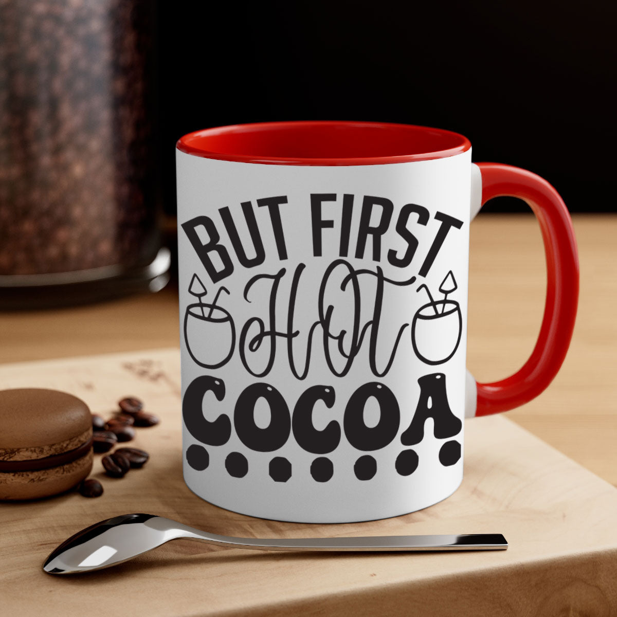 A stylish two-tone But First Hot Cocoa Mug with a colored handle and glossy finish, perfect for winter beverages.