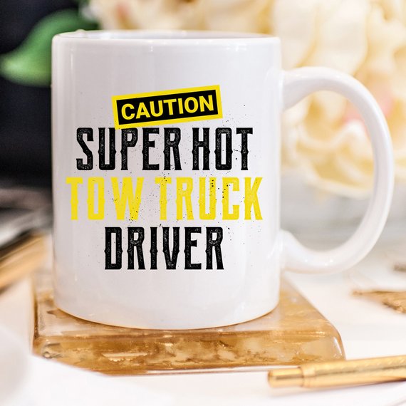 Caution Super Hot Tow Truck Driver funny coffee mug with a humorous design, perfect for coffee lovers and tow truck enthusiasts.