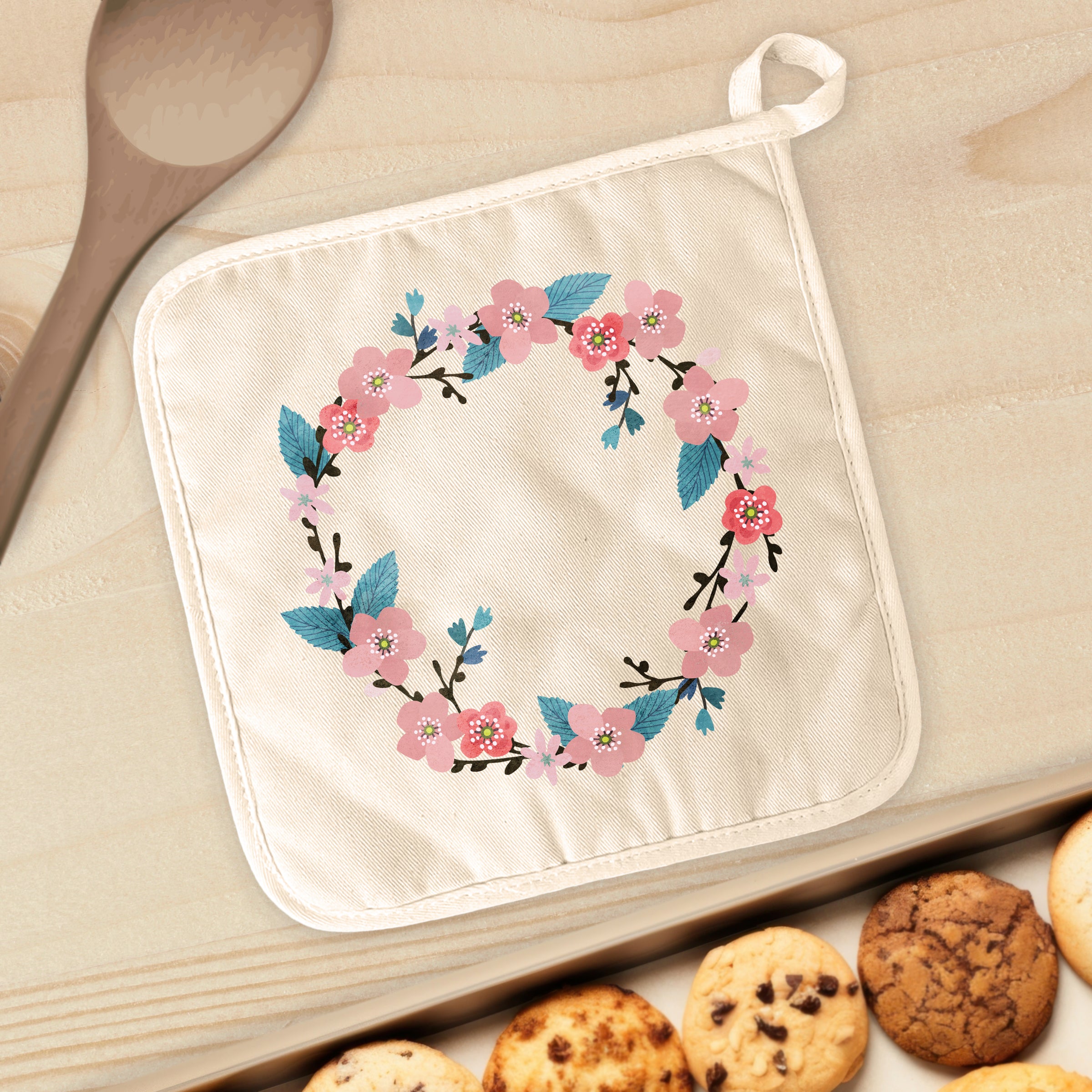 Cherry Blossom Wreath cotton pot holder with vibrant floral design, perfect for protecting surfaces from hot cookware.