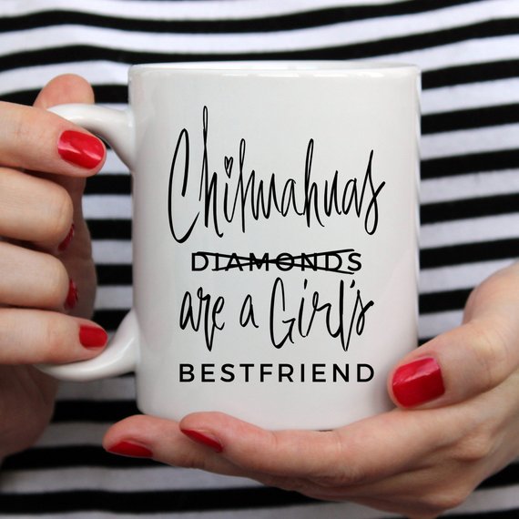 A humorous coffee mug featuring a Chihuahua design with the phrase 'Chihuahuas Are A Girl's Best Friend', crafted from high-quality ceramic.