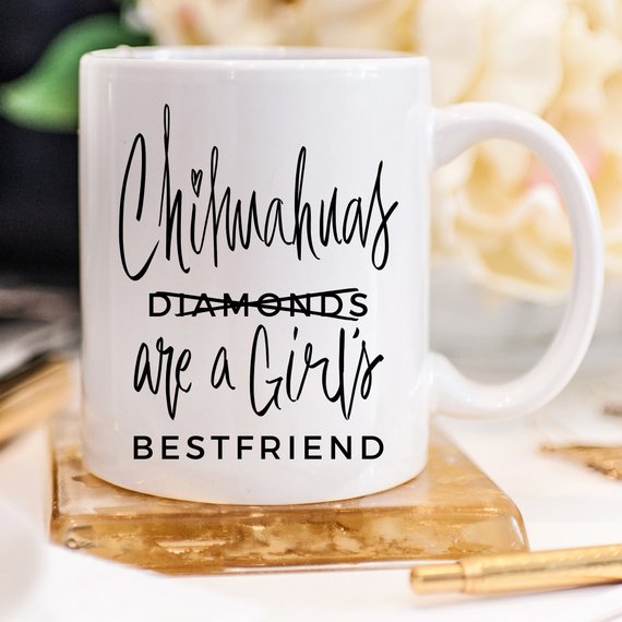 A humorous coffee mug featuring a Chihuahua design with the phrase 'Chihuahuas Are A Girl's Best Friend', crafted from high-quality ceramic.