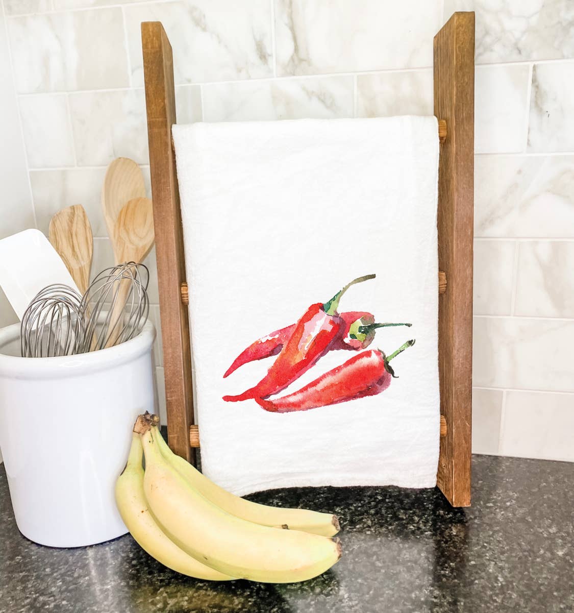 Chili Peppers Cotton Tea Towel featuring vibrant chili pepper design on absorbent fabric, perfect for kitchen use.