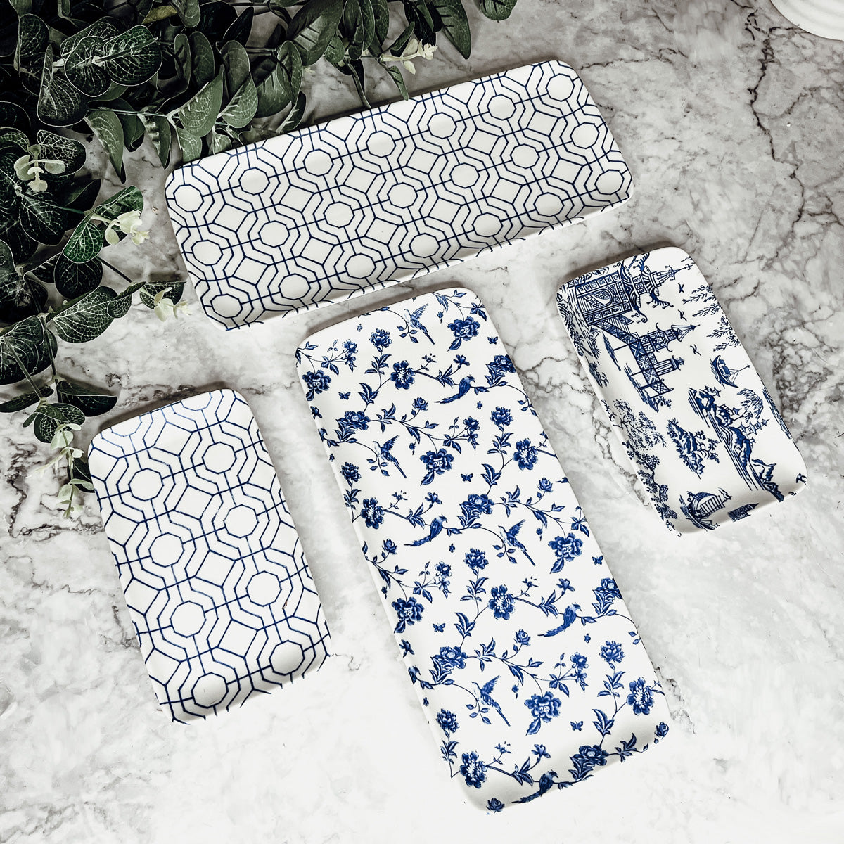 Chinoiserie Serving Set featuring 4 pieces with blue and white patterns, including serving and tidbit trays.