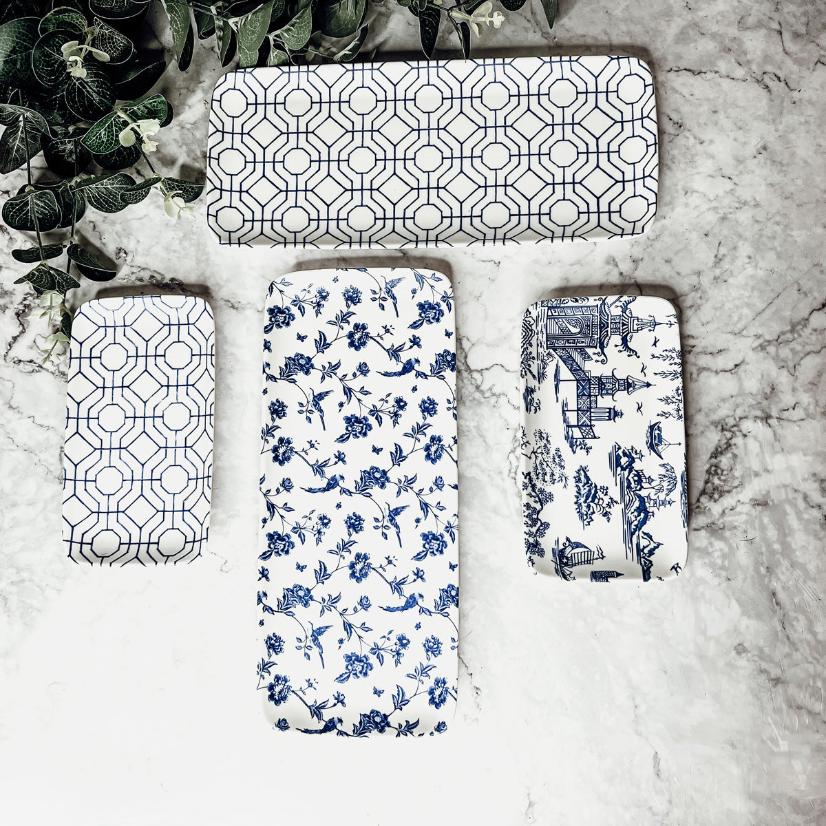 Chinoiserie Serving Set featuring 4 pieces with blue and white patterns, including serving and tidbit trays.