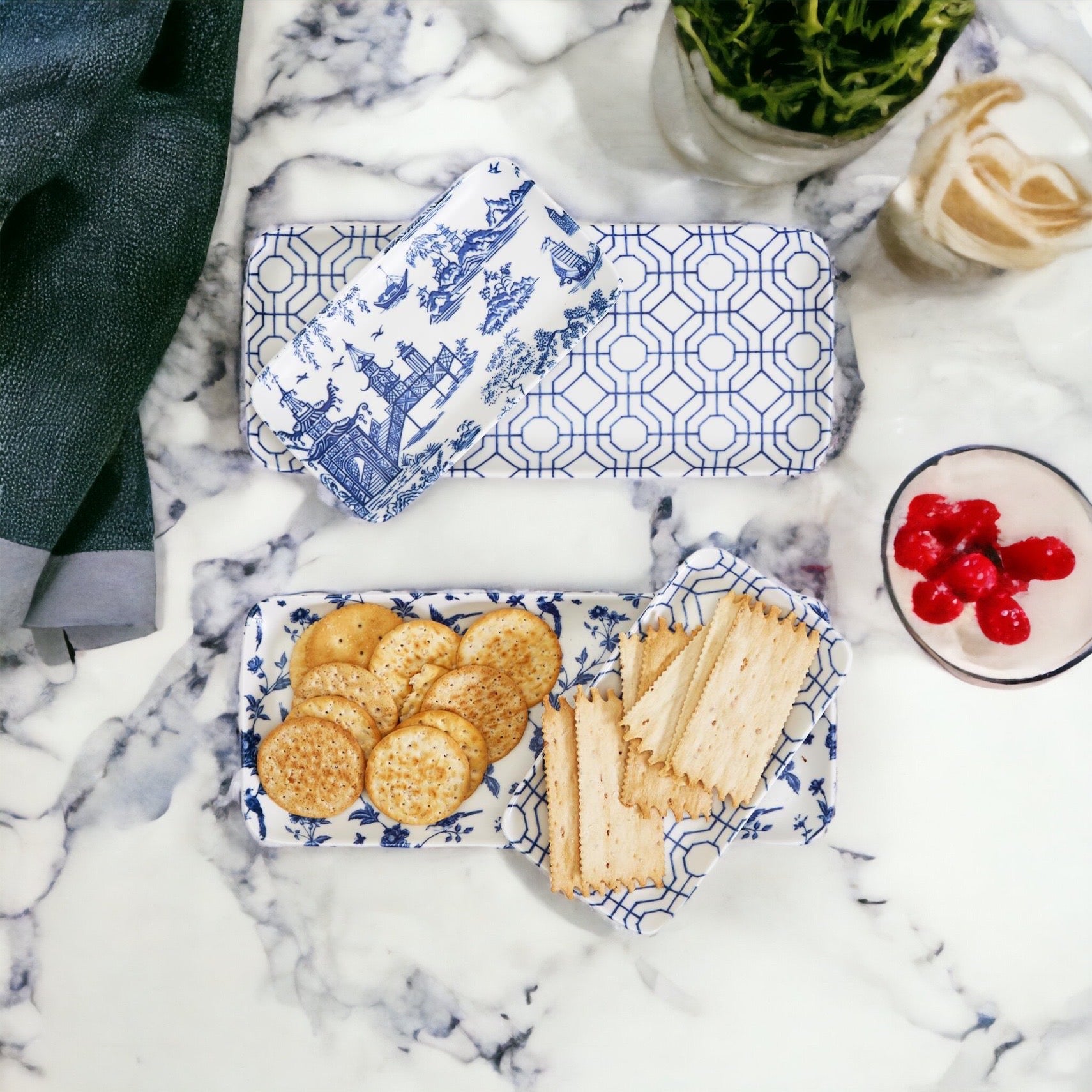 Chinoiserie Serving Set featuring 4 pieces with blue and white patterns, including serving and tidbit trays.