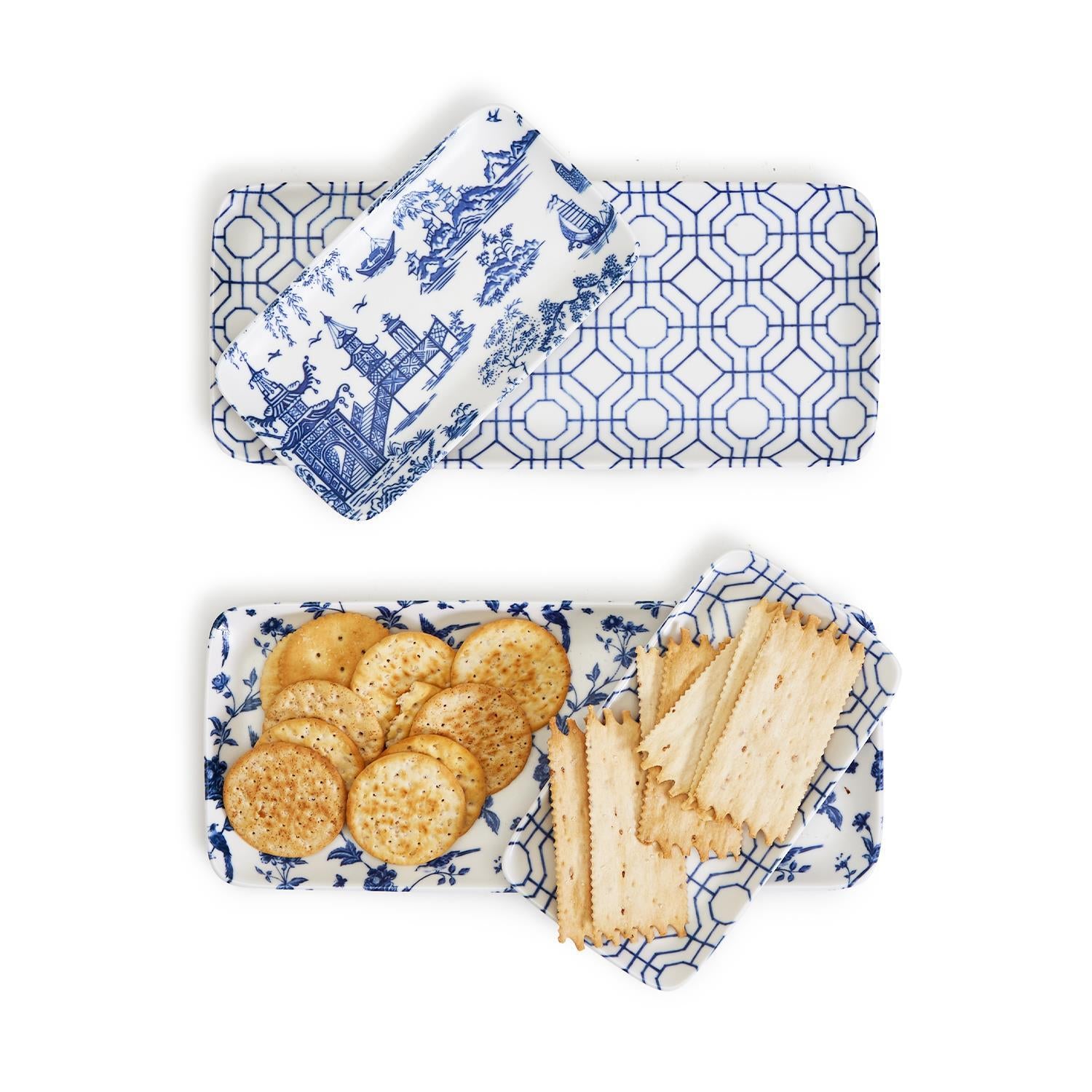 Chinoiserie Serving Set featuring 4 pieces with blue and white patterns, including serving and tidbit trays.