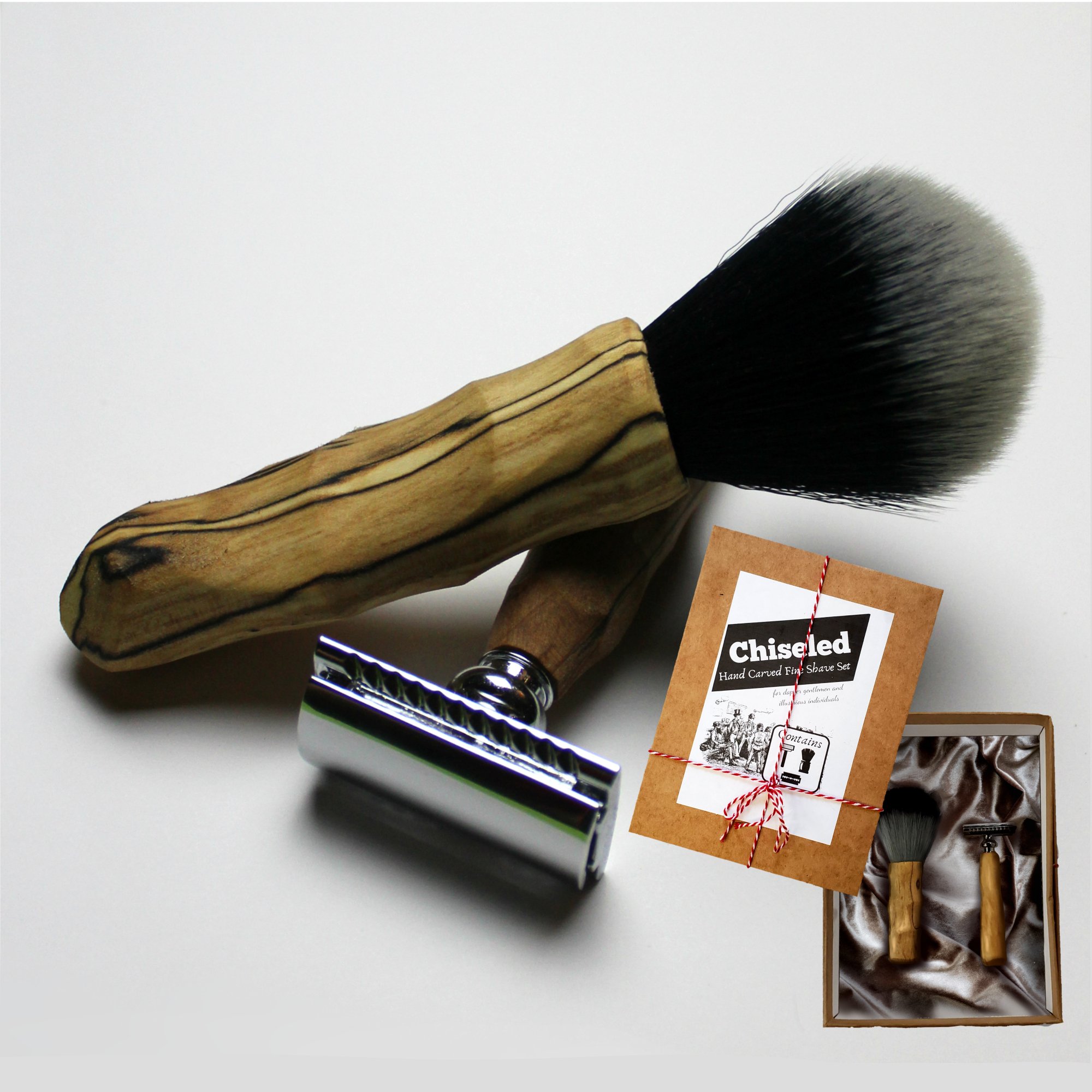 Chiseled Safety Razor and Shaving Brush Combo Set displayed in an elegant gift box with satin lining.