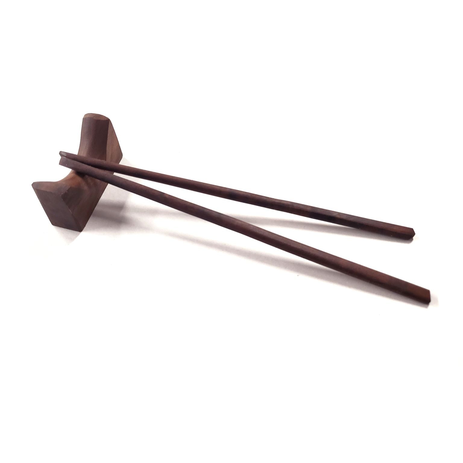 A pair of 10-inch wooden chopsticks made from Walnut and Cherry, with a stylish chopstick rest included.