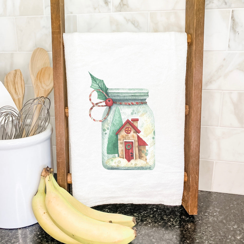 Christmas Snow Jar cotton tea towel featuring a vibrant holiday design, made from 100% absorbent cotton.