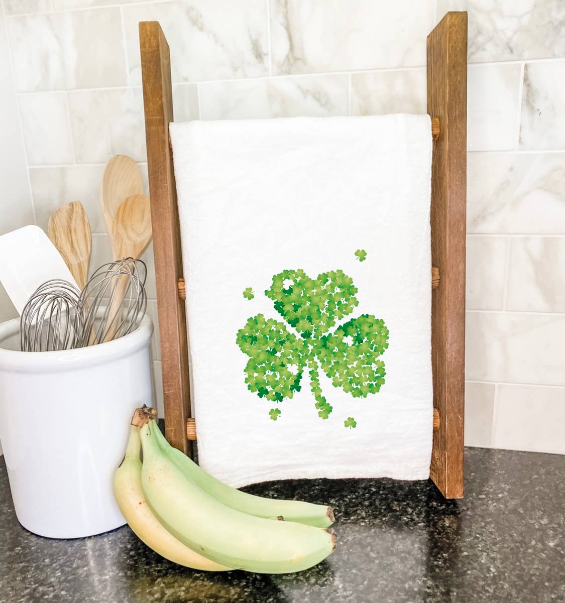 Clover of Clovers Cotton Tea Towel featuring a vibrant clover design, hemmed edges, and a square shape, perfect for kitchen use.